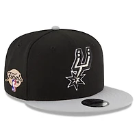 Casquette snapback New Era 9FIFTY pour jeunes, noire et grise, San Antonio Spurs, écusson latéral des finales NBA 2026.