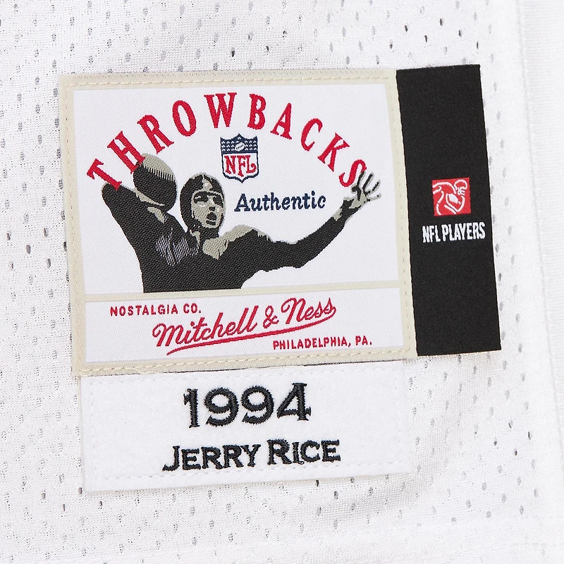 Maillot Mitchell & Ness Jerry Rice blanc des 49ers de San Francisco, édition 1994, authentique et rétro, porté par un joueur retraité.