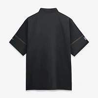 Veste d'entraîneur Nike noire pour homme, modèle Sideline des 49ers de San Francisco, manches courtes et fermeture éclair au quart.