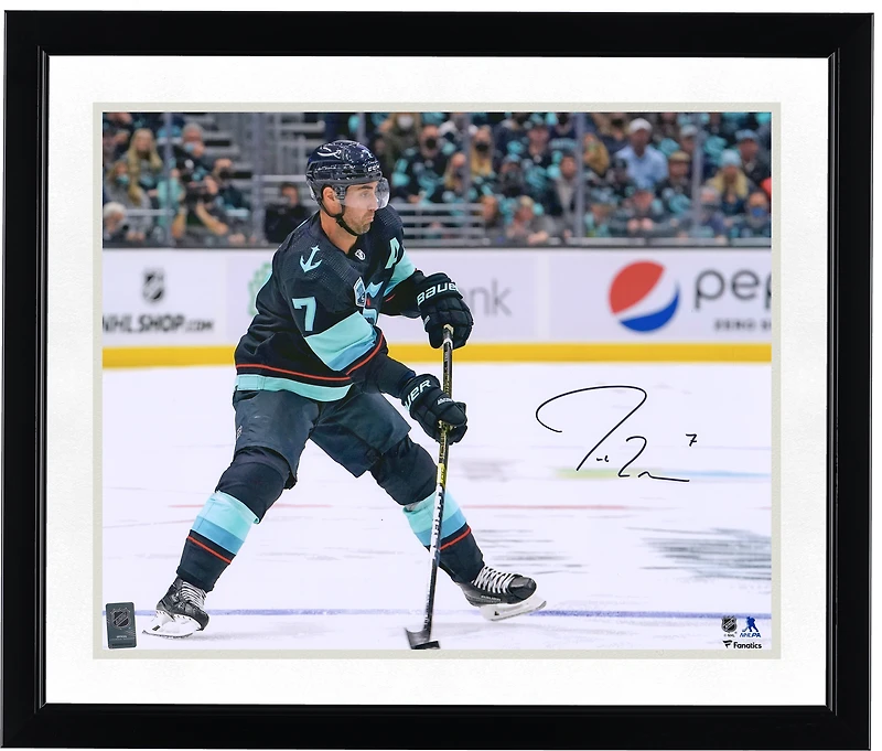 Jordan Eberle Seattle Kraken Autographed 16" x 20" Deep Sea Blue Jersey Skating Photograph