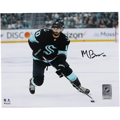 Matty Beniers Seattle Kraken Autographed 8" x 10" Navy Jersey with Puck Photograph