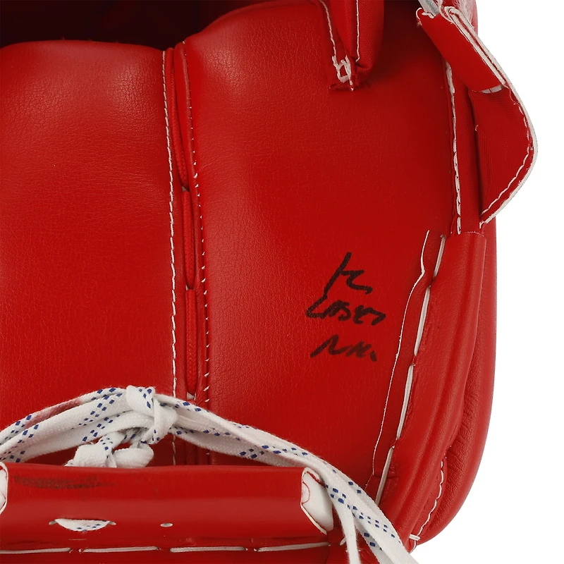Jambières de gardien de but rouges autographiées par Jordan Binnington des Blues de St. Louis lors de la saison 2021 de la LNH