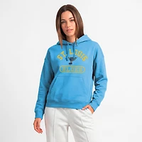 Sweat à capuche Champion bleu clair pour femme, modèle St. Louis Blues, motif pilulier arqué.