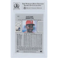 Carte autographiée par Ozzie Smith (St. Louis Cardinals) de 1990, Leaf n° 142, authentifiée Beckett Fanatics Witnessed (9/10).