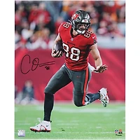 Cade Otton Tampa Bay Buccaneers Autographed 16" x 20" Red Jersey Running with Ball  Photograph