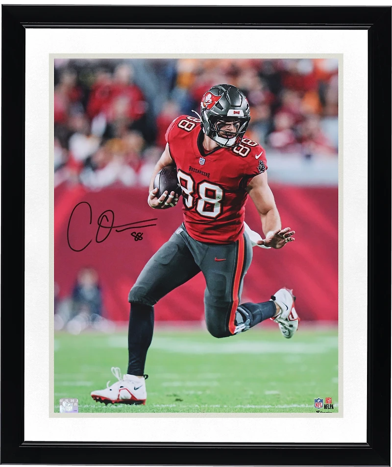 Cade Otton Tampa Bay Buccaneers Autographed 16" x 20" Red Jersey Running with Ball  Photograph