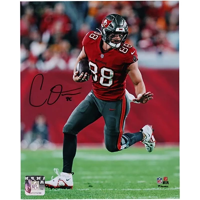 Cade Otton Tampa Bay Buccaneers Autographed 8" x 10" Red Jersey Running with Ball Photograph