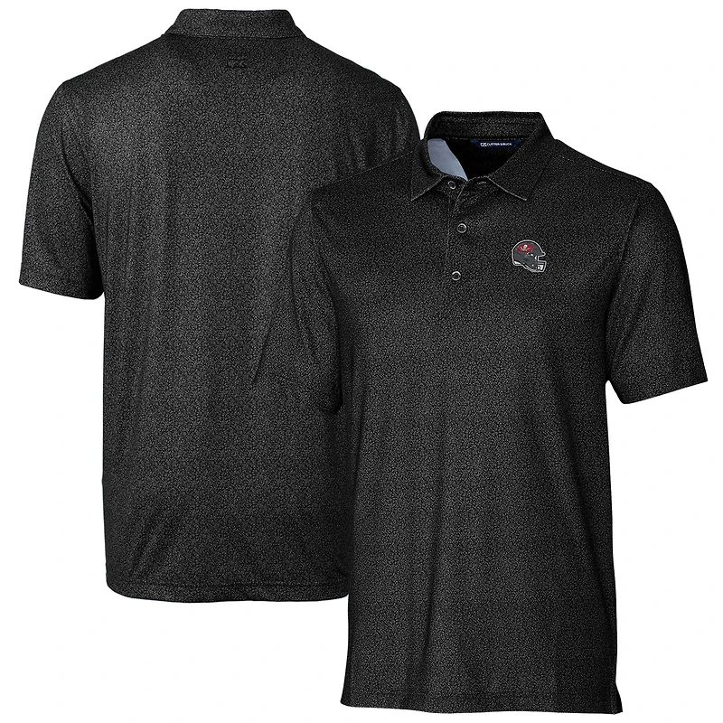 Polo extensible noir à imprimé micro-fleurs pour homme Cutter & Buck, motif casque des Tampa Bay Buccaneers