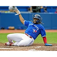 Photographie non signée de Vladimir Guerrero Jr., joueur des Blue Jays Toronto, lors d'un match glisse à domicile