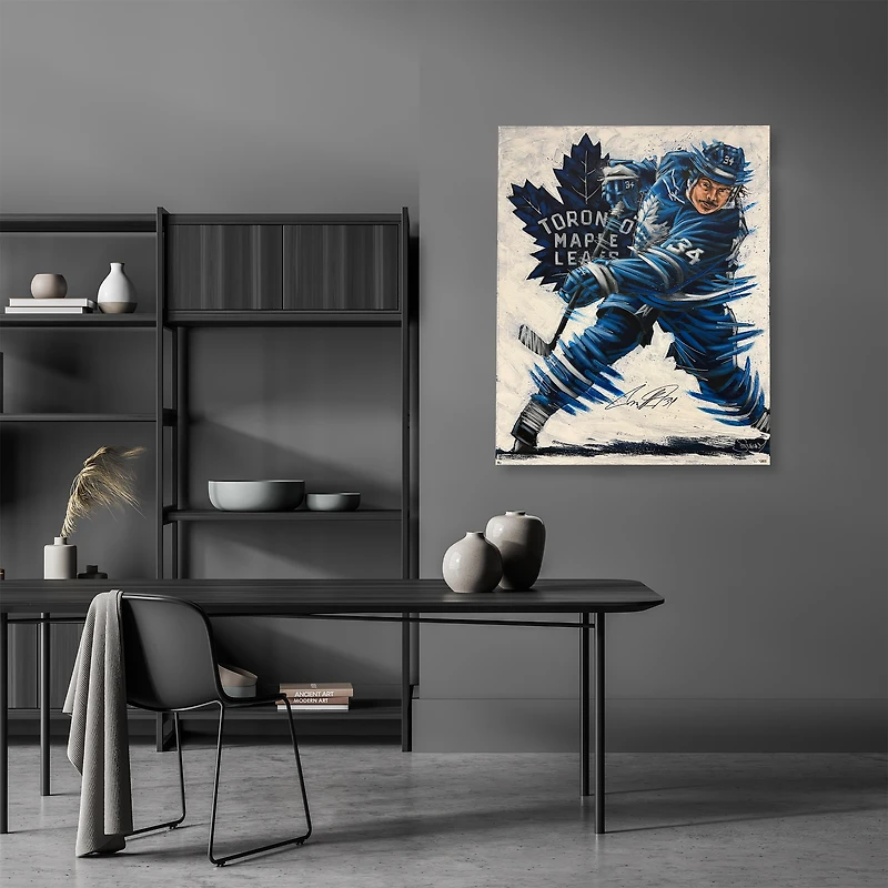 Auston Matthews, joueur des Maple Leafs de Toronto, autographié sur toile tendue (76 x 102 cm) - Illustration d'Eric Sevigny - Exemplaire n° 1 d'une édition limitée.