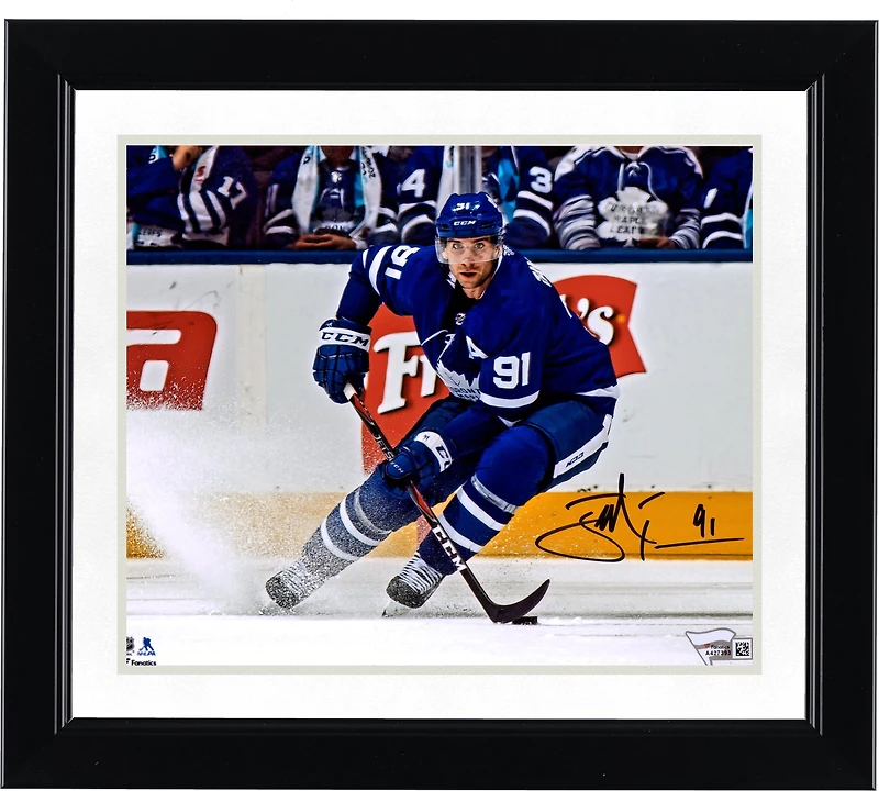 John Tavares Toronto Maple Leafs Autographed 8" x 10" Blue Jersey Turning Horizontal Photograph