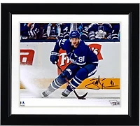 John Tavares Toronto Maple Leafs Autographed 8" x 10" Blue Jersey Turning Horizontal Photograph