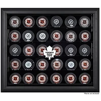 Vitrine noire pour 30 rondelles des Maple Leafs de Toronto (1970-2016)