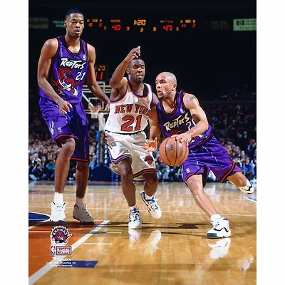 Photographie non signée de Damon Stoudamire, joueur Toronto Raptors, au volant