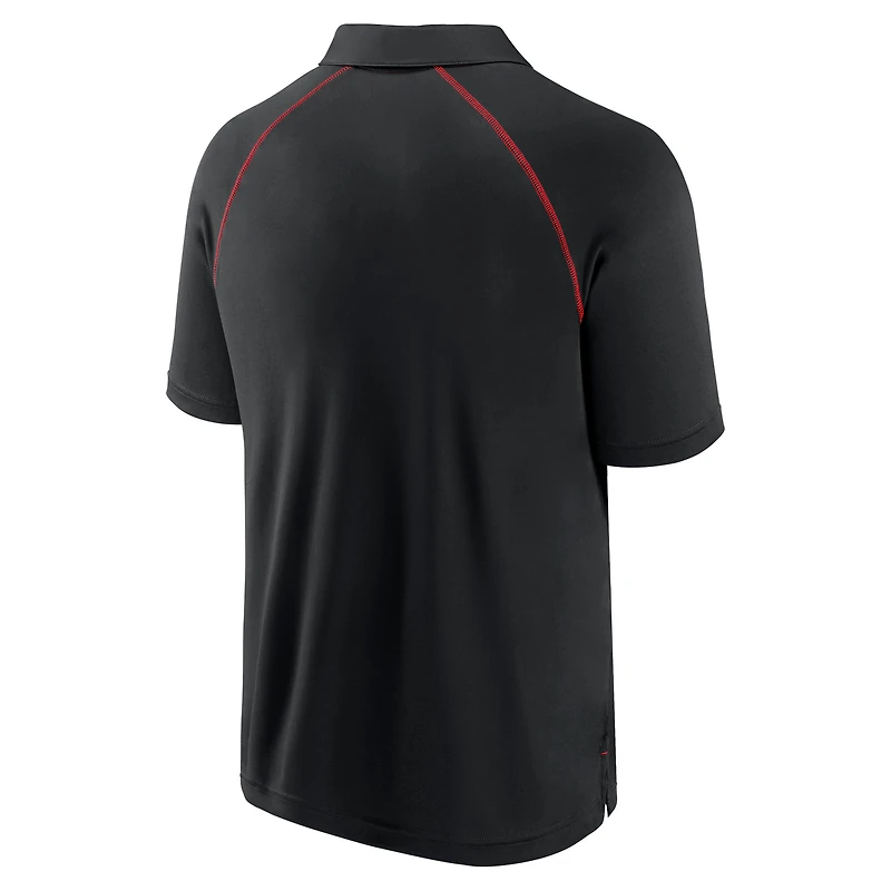 Polo raglan noir Strong Alone des Raptors de Toronto Fanatics pour hommes