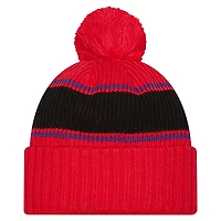 Bonnet à revers rouge Toronto Raptors pour homme, avec pompon, de la marque New Era.