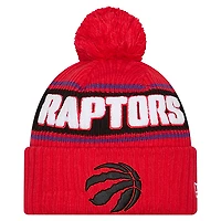 Bonnet à revers rouge Toronto Raptors pour homme, avec pompon, de la marque New Era.