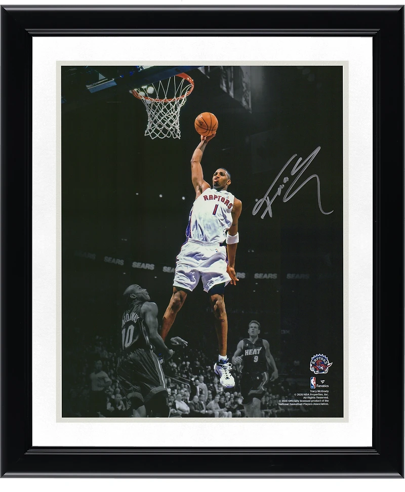 Tracy McGrady Toronto Raptors Autographed 11" x 14" Spotlight Dunk vs. Miami Heat Photograph