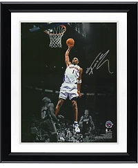Tracy McGrady Toronto Raptors Autographed 11" x 14" Spotlight Dunk vs. Miami Heat Photograph