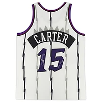 Maillot authentique Mitchell & Ness 1998-99, signé par Vince Carter, joueur des Raptors de Toronto, avec inscription « 98/99 NBA ROY ».