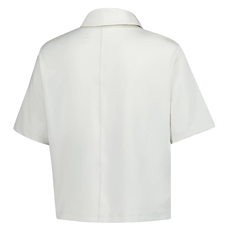 Polo court Under Armour blanc Truist Championship Drive Charm pour femme