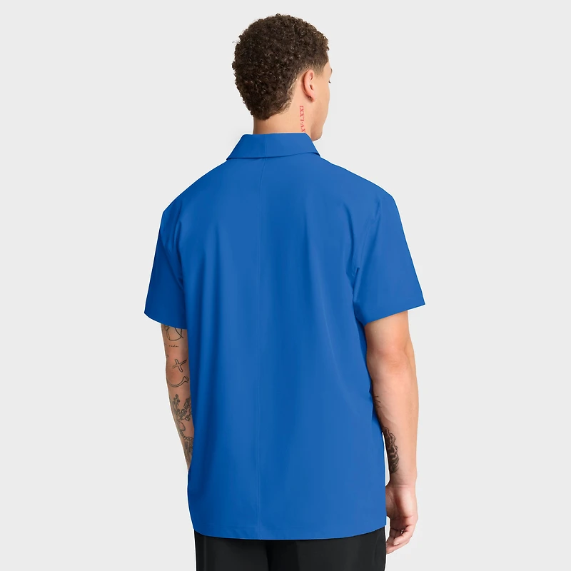 Polo Jordan Brand bleu pour homme, équipe des Bruins de l'UCLA 2025, entraîneurs, ligne touche