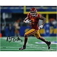 Photographie autographiée de 20,3 x 25,4 cm de Brenden Rice, USC Trojans, courant avec un maillot rouge