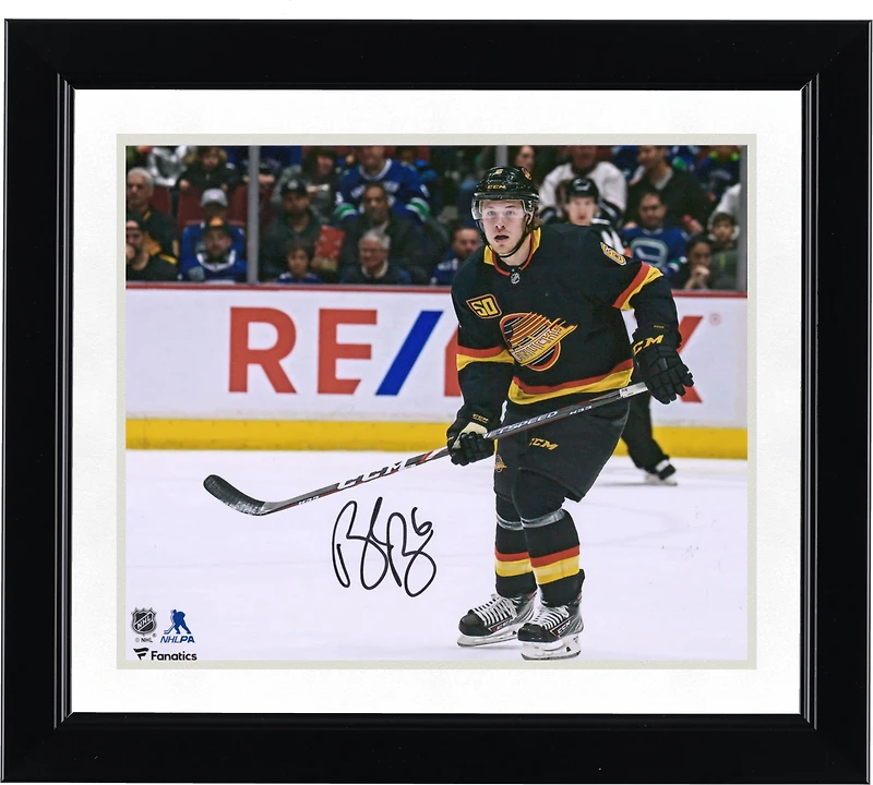Brock Boeser Vancouver Canucks Autographed 8" x 10" Black Jersey Skating Photograph