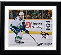 Brock Boeser Vancouver Canucks Autographed 8" x 10" White Jersey Skating with Puck Photograph
