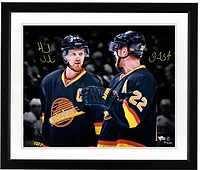 Daniel Sedin and Henrik Sedin Vancouver Canucks Autographed 16" x 20" Throwback Jersey Spotlight Photograph