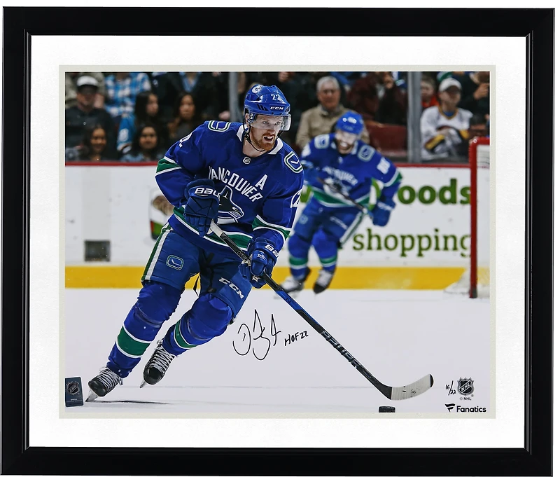 Daniel Sedin Vancouver Canucks Autographed 16" x 20" Blue Jersey Skating Photograph with "HOF 22" Inscription - Limited Edition of 22