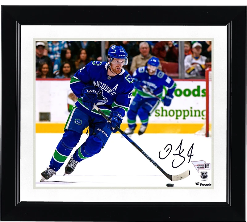 Photo de patinage autographiée de Daniel Sedin, joueur des Canucks de Vancouver