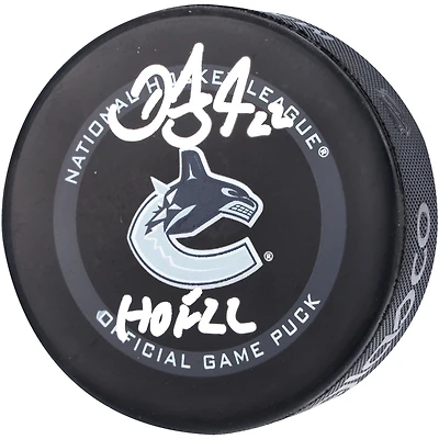 Rondelle de match officielle autographiée par Daniel Sedin des Canucks de Vancouver avec l'inscription « HOF 22 »