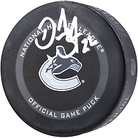 Rondelle de match officielle de la LNH autographiée par Daniel Sedin des Canucks de Vancouver