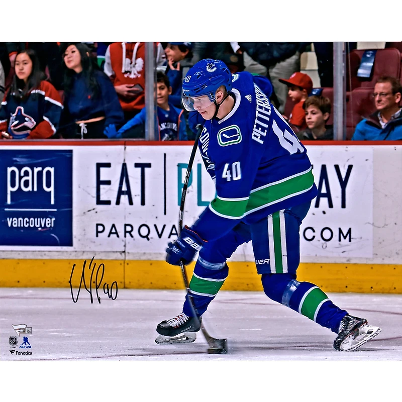 Elias Pettersson Vancouver Canucks Autographed 16" x 20" Blue Jersey Shooting Photograph