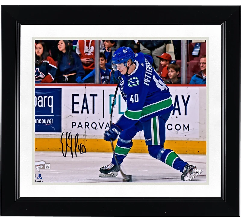 Elias Pettersson Vancouver Canucks Autographed 8" x 10" Blue Jersey Shooting Photograph