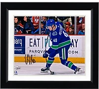 Elias Pettersson Vancouver Canucks Autographed 8" x 10" Blue Jersey Shooting Photograph