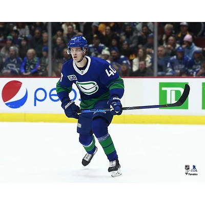 Elias Pettersson Vancouver Canucks Unsigned Blue Alternate Jersey Skating Photograph