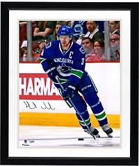 Henrik Sedin Vancouver Canucks Autographed 16" x 20" Blue Jersey Skating Photograph