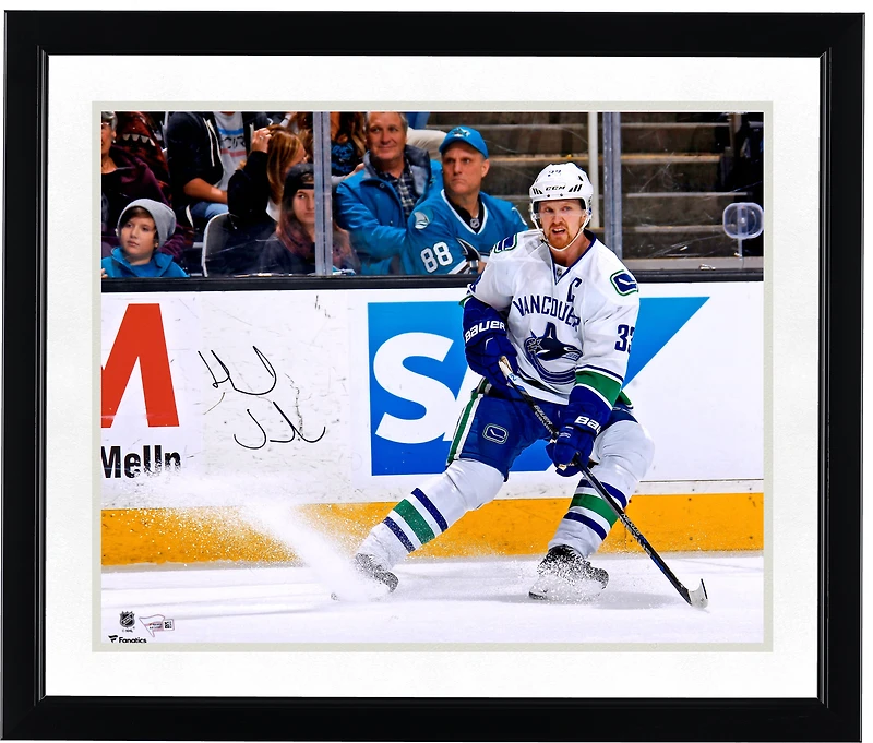 Henrik Sedin Vancouver Canucks Autographed 16" x 20" White Jersey Stopping Photograph