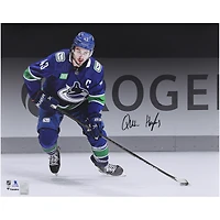 Quinn Hughes Vancouver Canucks Autographed 16" x 20" Blue Jersey Spotlight Photograph 
