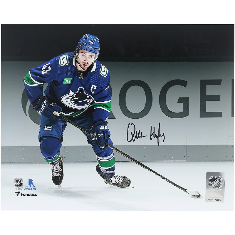 Quinn Hughes Vancouver Canucks Autographed 8" x 10" Blue Jersey Spotlight Photograph 
