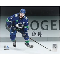 Quinn Hughes Vancouver Canucks Autographed 8" x 10" Blue Jersey Spotlight Photograph 