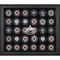 Vitrine noire pour 30 rondelles des Canucks de Vancouver