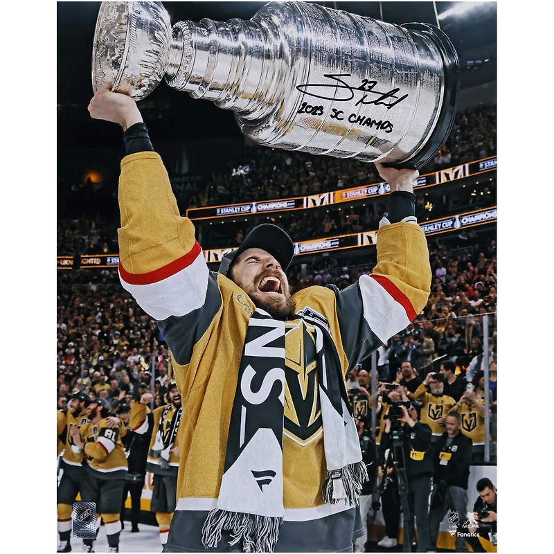 Shea Theodore Vegas Golden Knights Autographed 2023 Stanley Cup Champions 16" x 20" Raising Cup Photograph with "2023 SC Champs" Inscription