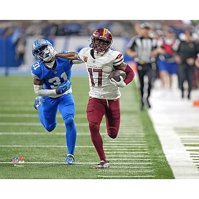 Terry McLaurin Washington Commanders Unsigned 2024 Playoffs Divisional Round Stiff-Arm Photograph