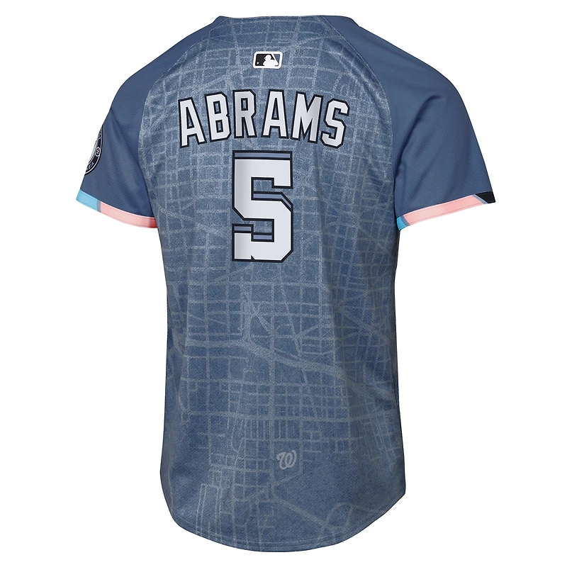 Maillot de joueur Nike CJ Abrams bleu pour jeune des Washington Nationals 2025 City Connect Limited
