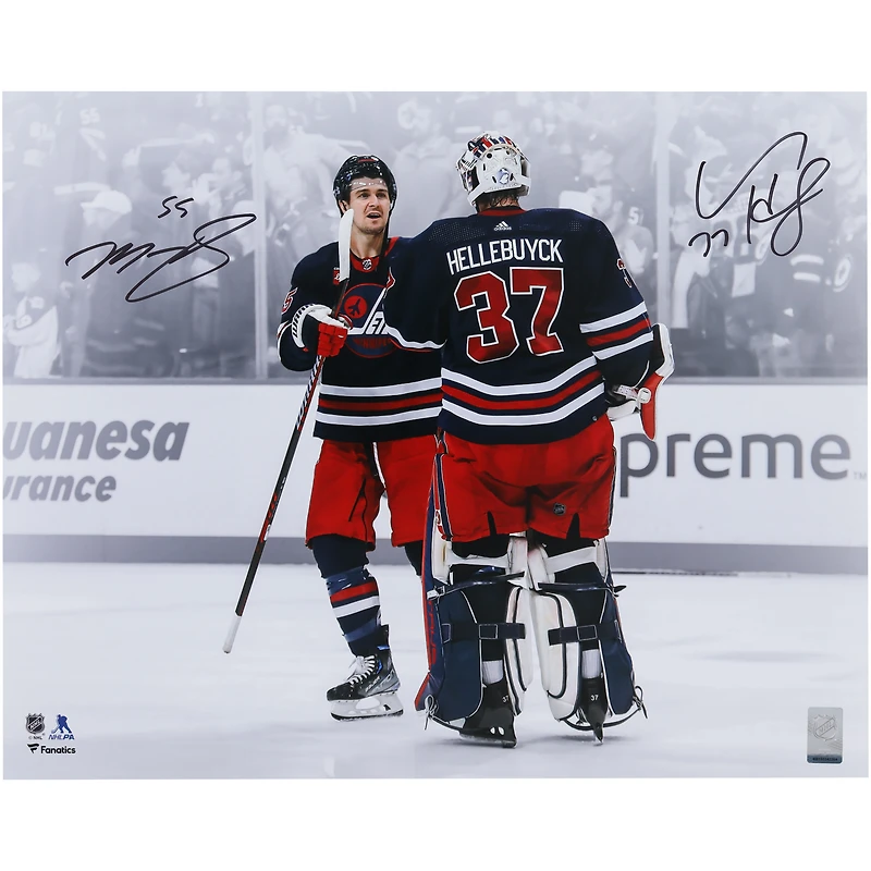 Connor Hellebuyck & Mark Scheifele Winnipeg Jets Autographed 16" x 20" Navy Alternate Jersey Celebration Spotlight Photograph