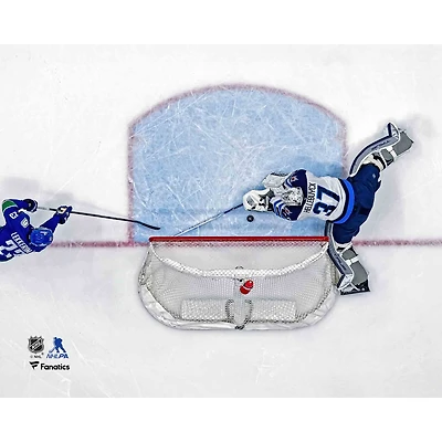 Connor Hellebuyck Winnipeg Jets Unsigned Diving Save Photograph
