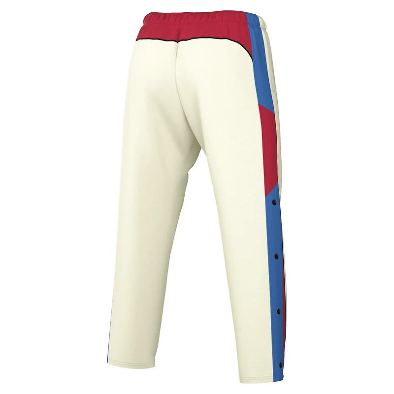 Pantalon unisexe Nike WNBA Legends crème tissé à boutons-pression